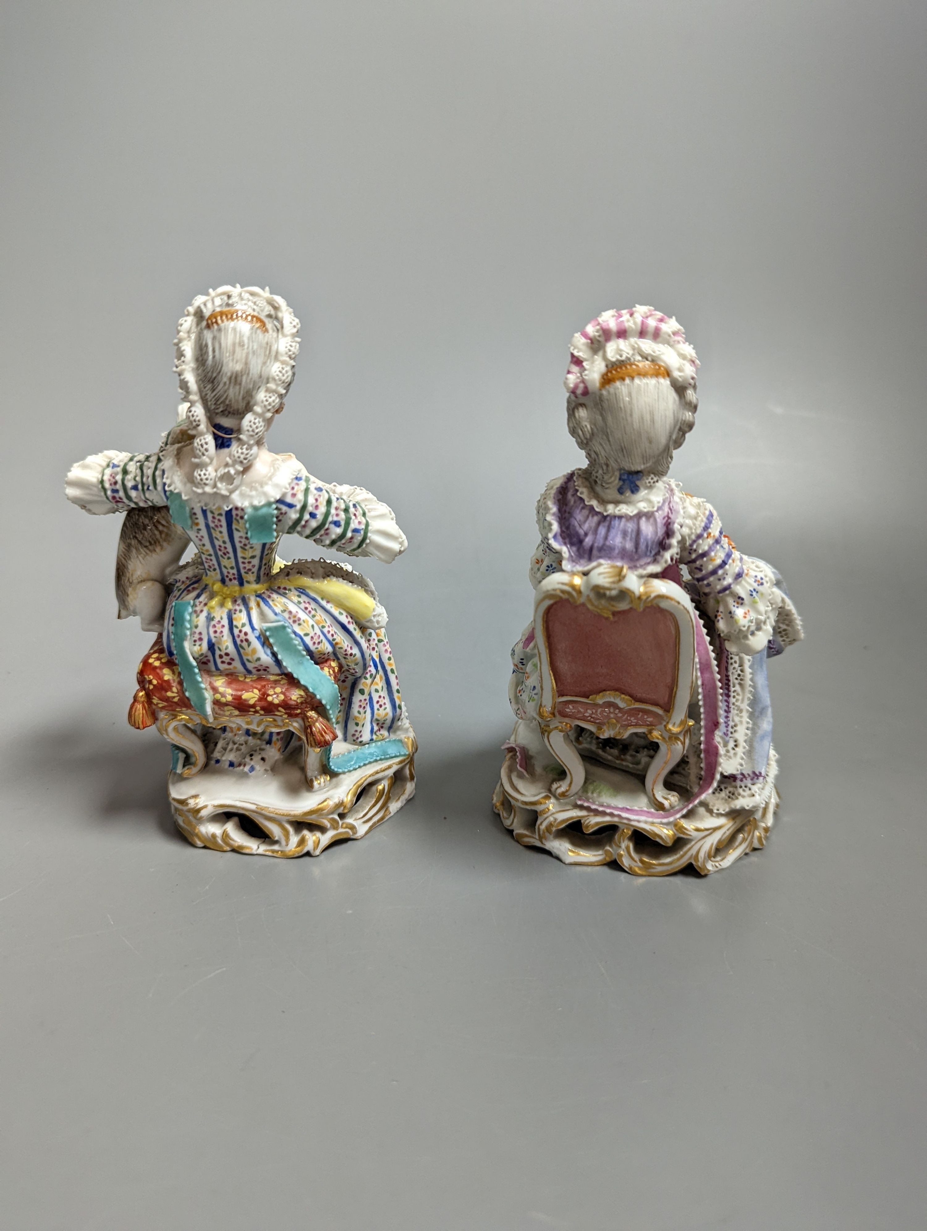 Two 19th century Meissen figures of seated ladies 13cms high